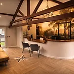 Wellness Tuin Woestijnroos Wellness Met Prive Sauna Stoomcabine En Jacuzzi Inclusief Gratis Prosecco En Partner Box - Ultieme Partner Beleving - * 호스트